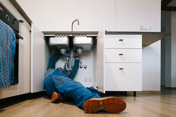 Professional Drain Cleaning technician working in Millington, TN